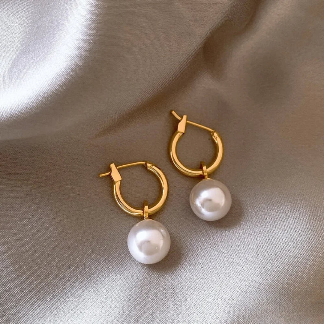 Boucles d’oreilles élégantes avec perles dorées