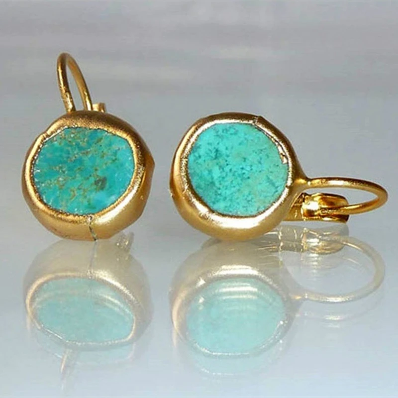 Boucles d’oreilles dorées avec pierre turquoise