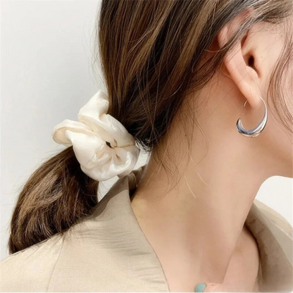 Boucles d’oreilles luxueuses en or et argent
