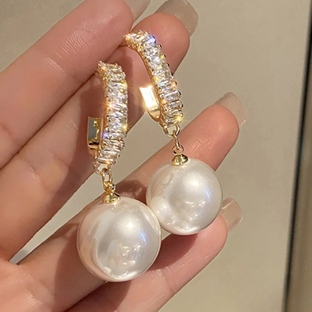 Boucles d’oreilles luxueuses en perles et zirconium