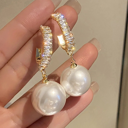 Boucles d’oreilles luxueuses en perles et zirconium
