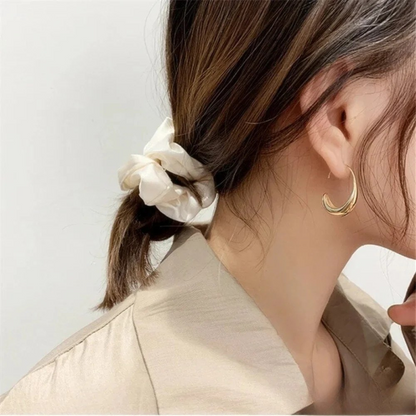 Boucles d’oreilles luxueuses en or et argent