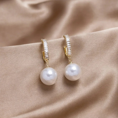 Boucles d’oreilles luxueuses en perles et zirconium