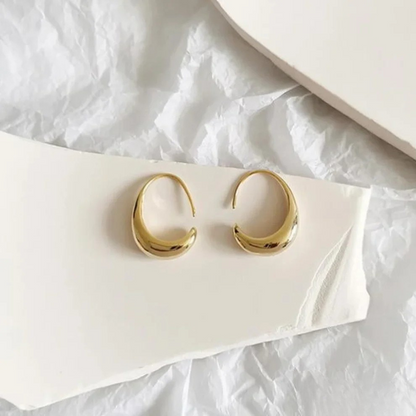 Boucles d’oreilles luxueuses en or et argent