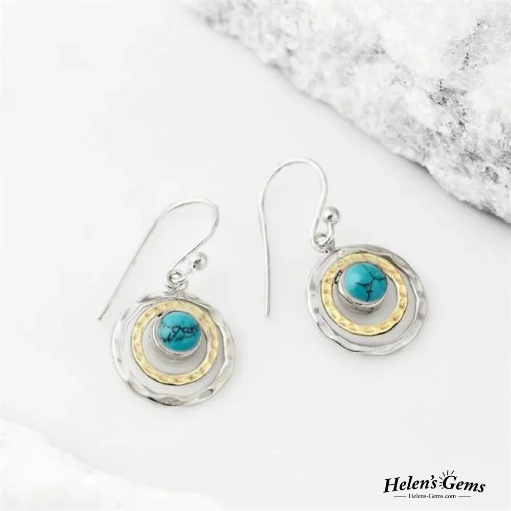 Boucles d’oreilles bohèmes Saturne avec pierre turquoise en argent et or
