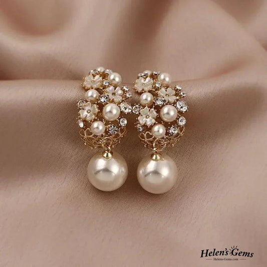 Boucles d’oreilles élégantes en forme de fleur avec perle